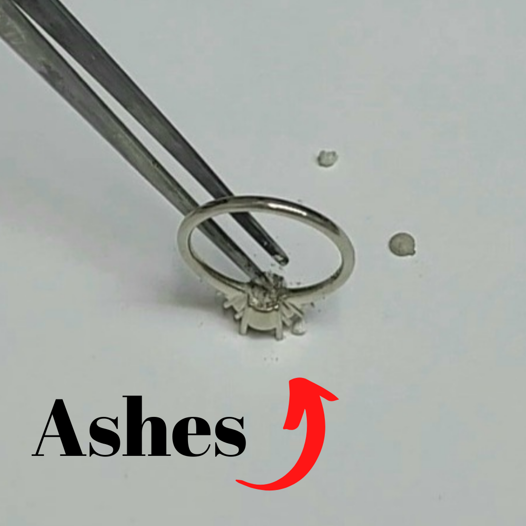 ring with ashes inside of it for mourning