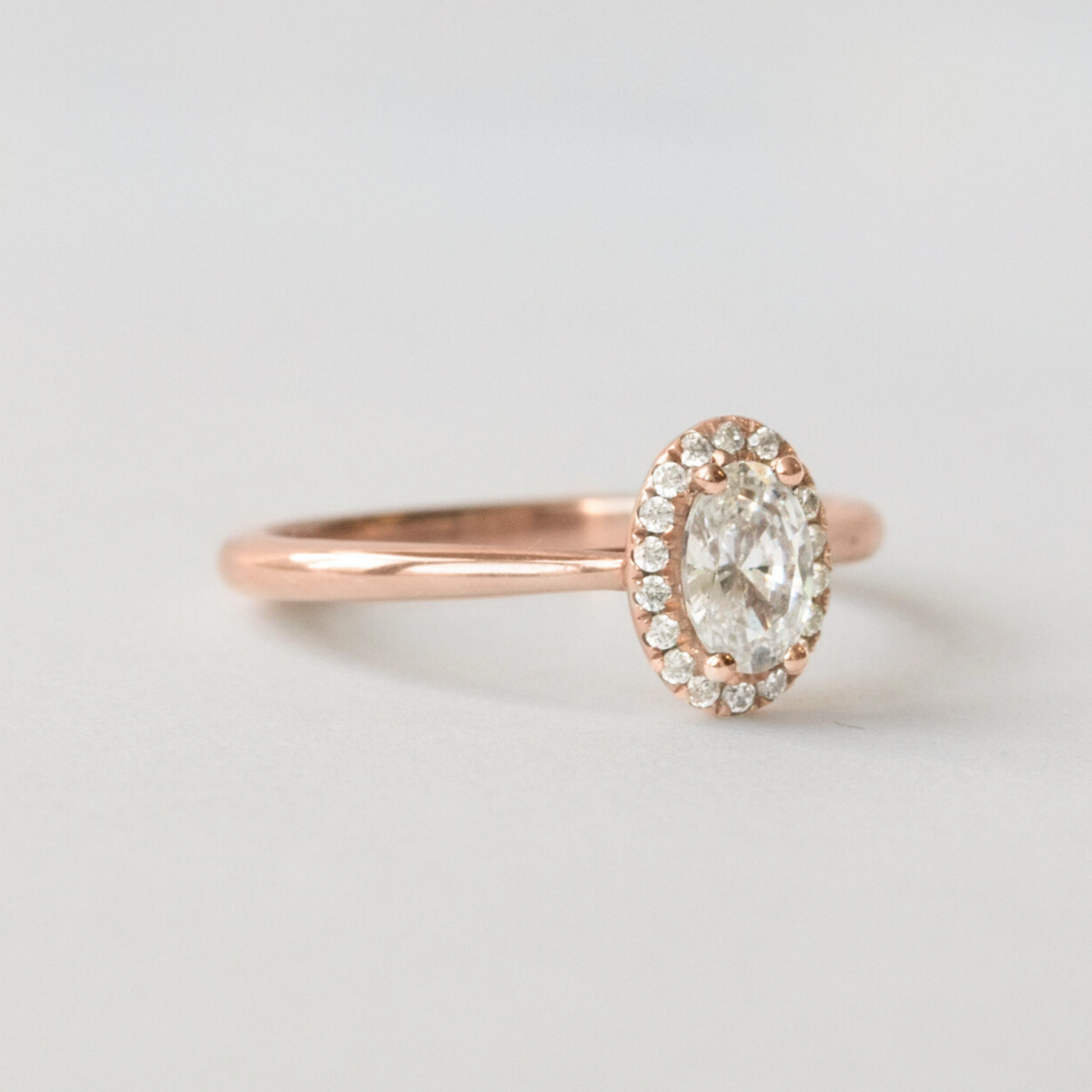 rose gold and diamond halo ring