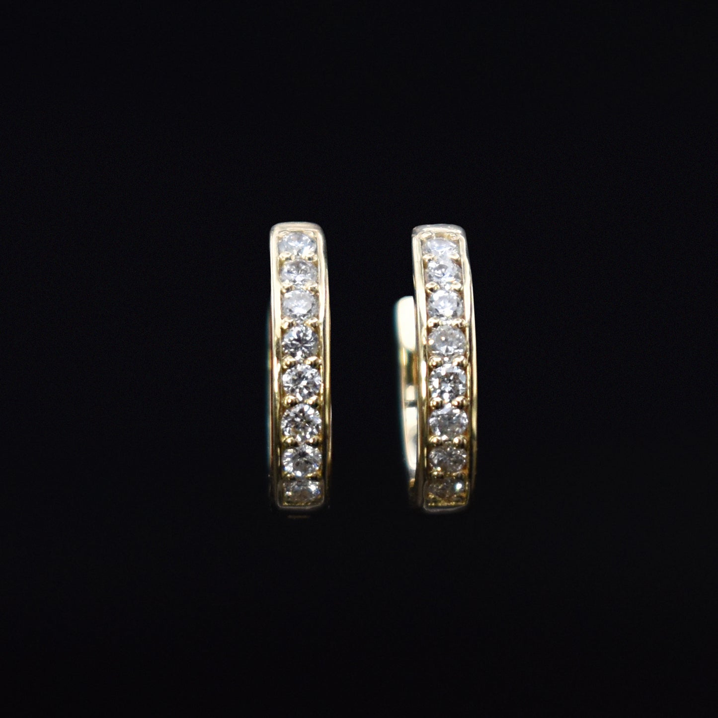 diamond huggie earrings in yellow gold