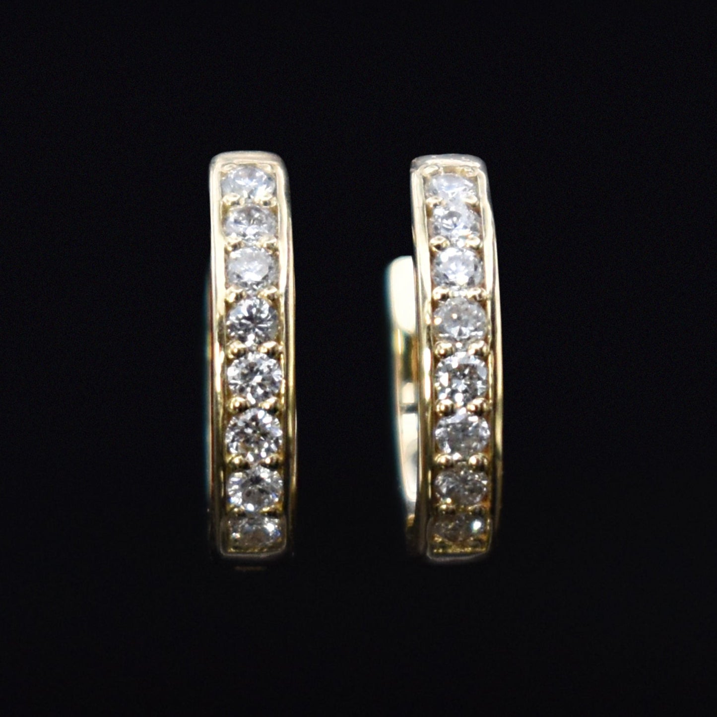 diamond huggie earrings in yellow gold