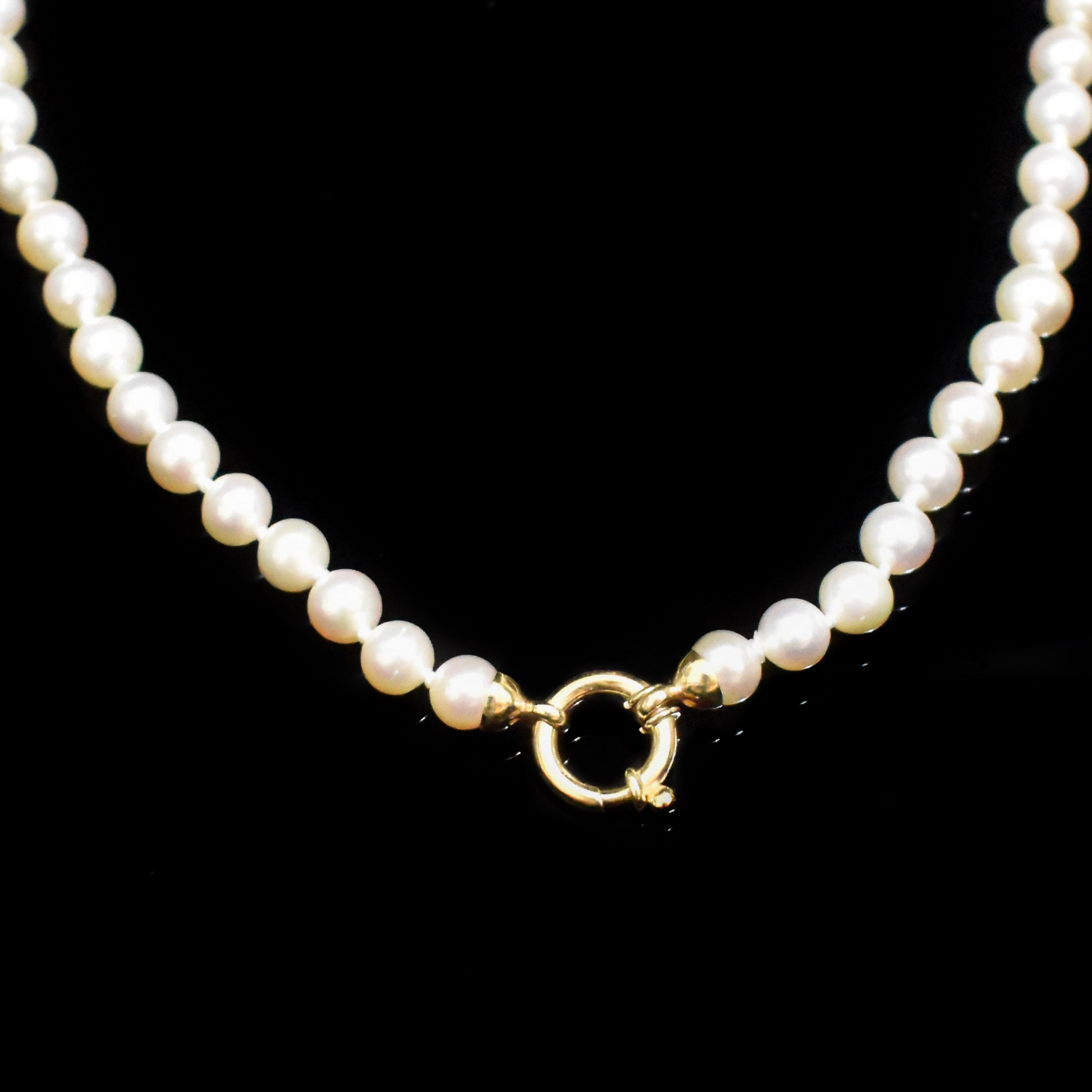 pearl necklace with gold nautical clasp