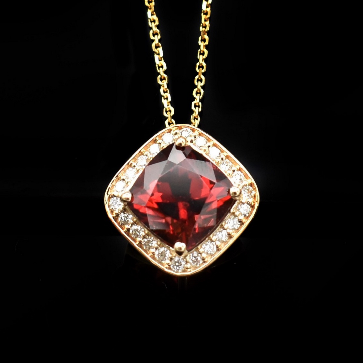 Cushion cut garnet and diamond necklace