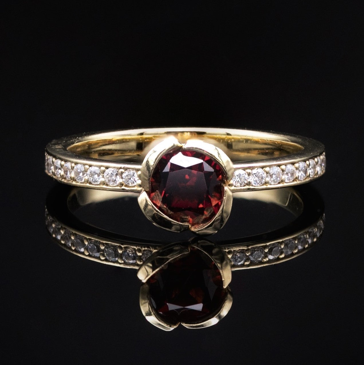 garnet engagement ring with diamonds