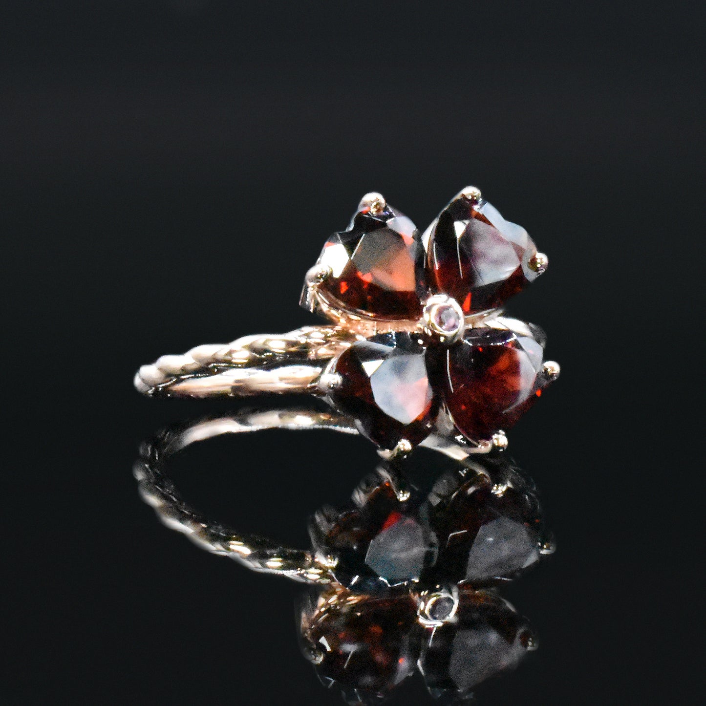 garnet four leaf clover ring with ashes inside for mourning
