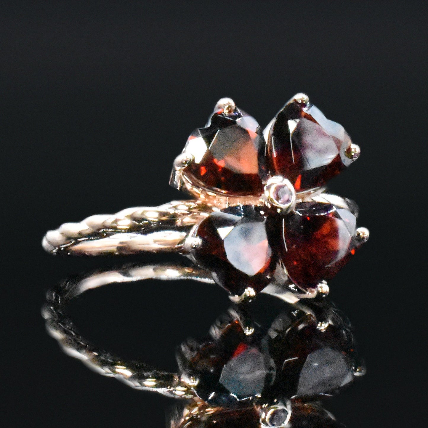 garnet four leaf clover ring with ashes inside for mourning