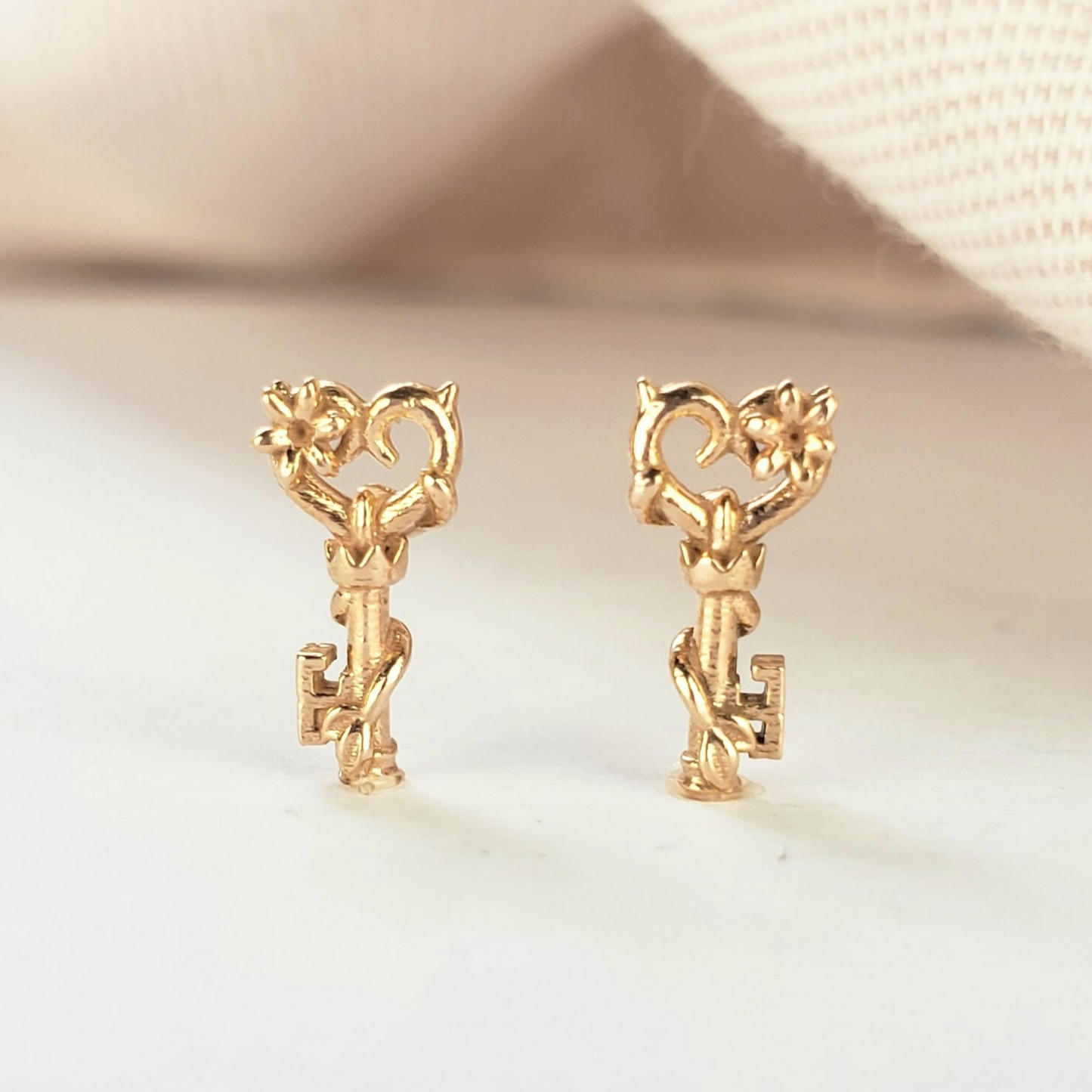 gold key studs