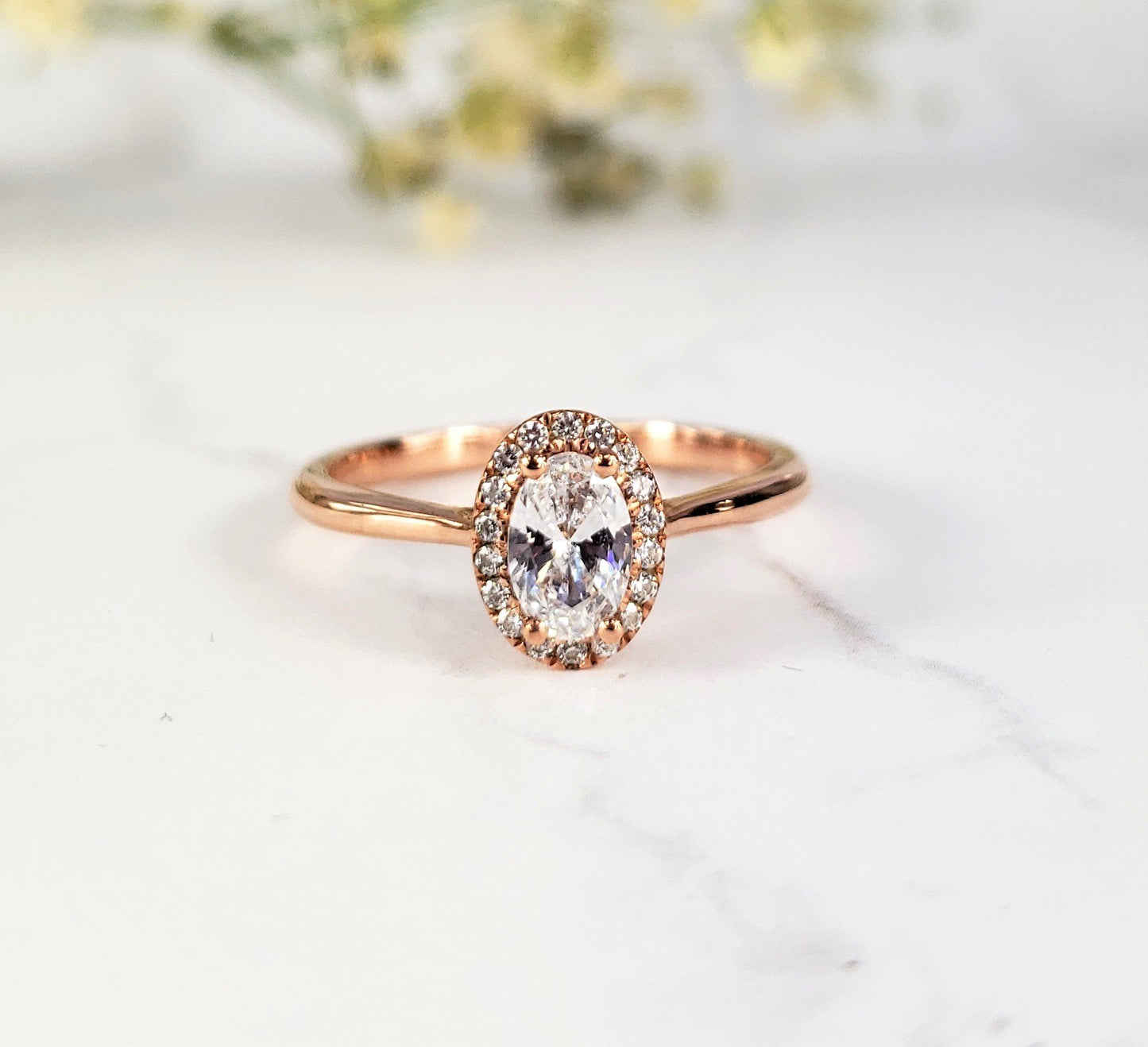rose gold halo engagement ring with diamond