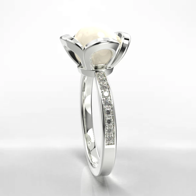 Pearl and diamond engagement ring in white gold
