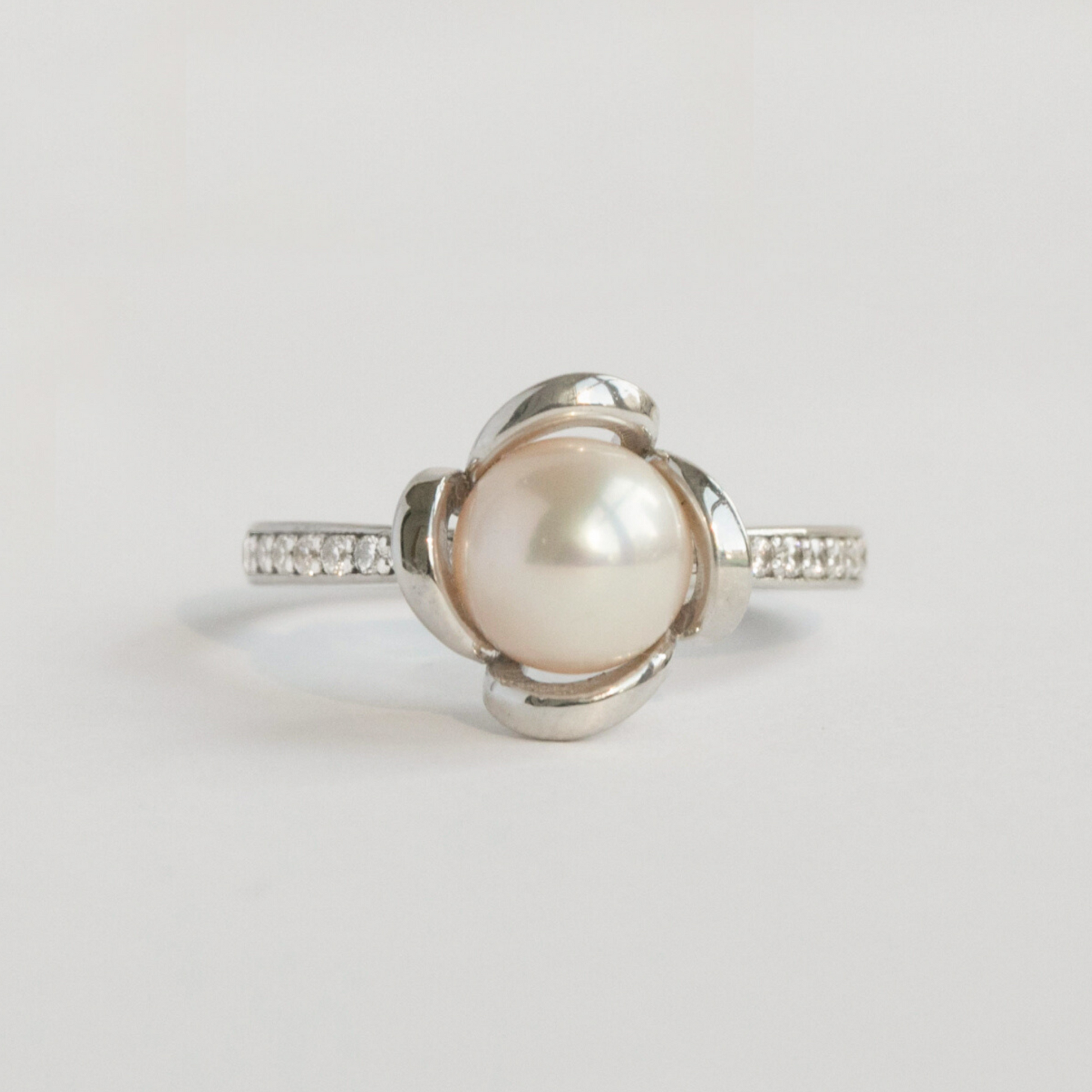 diamond and pearl engagement ring