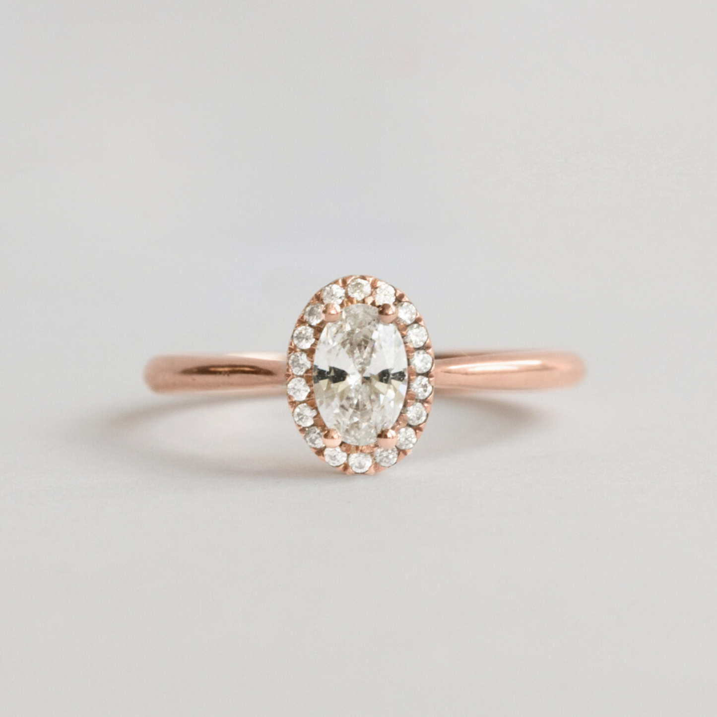 rose gold halo engagement ring