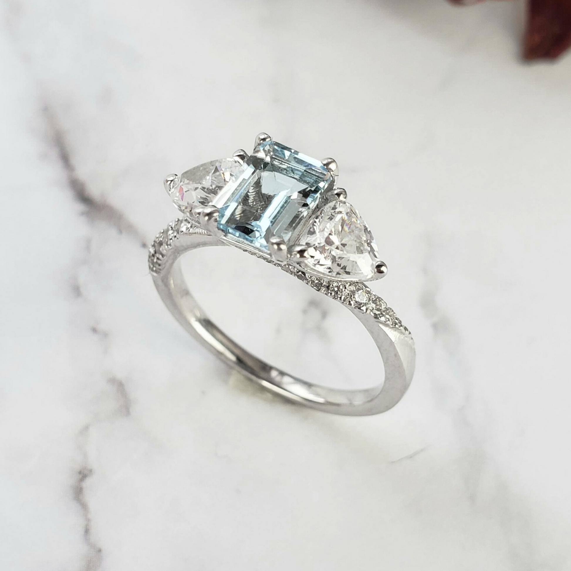 three stone diamond and aquamarine ring